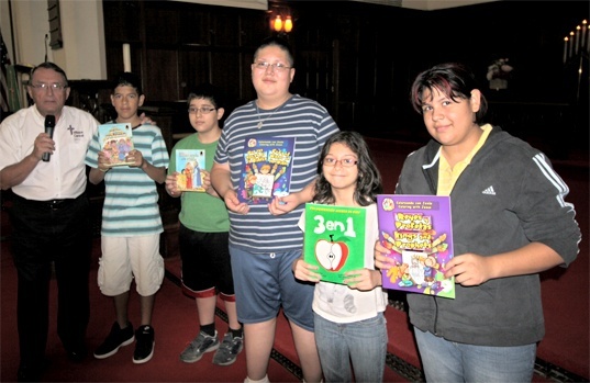 Gary with some of the students who received CGO books