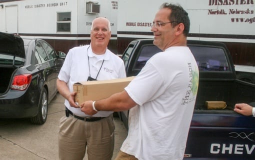 Volunteers delivering donated books from CGO Volunteers delivering donated books from CGO
