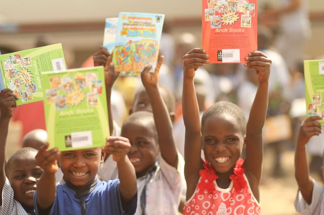 A celebration! The children were thrilled to receive their books.